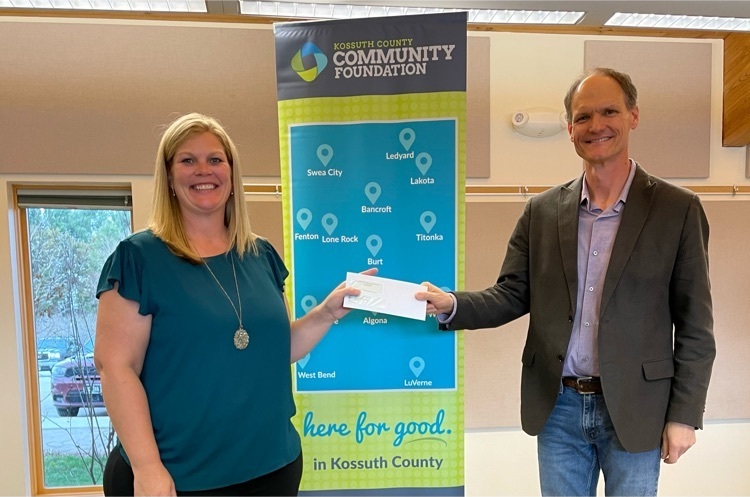 Mrs. Schutjer receiving the grant